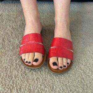 Red strapped sandals
